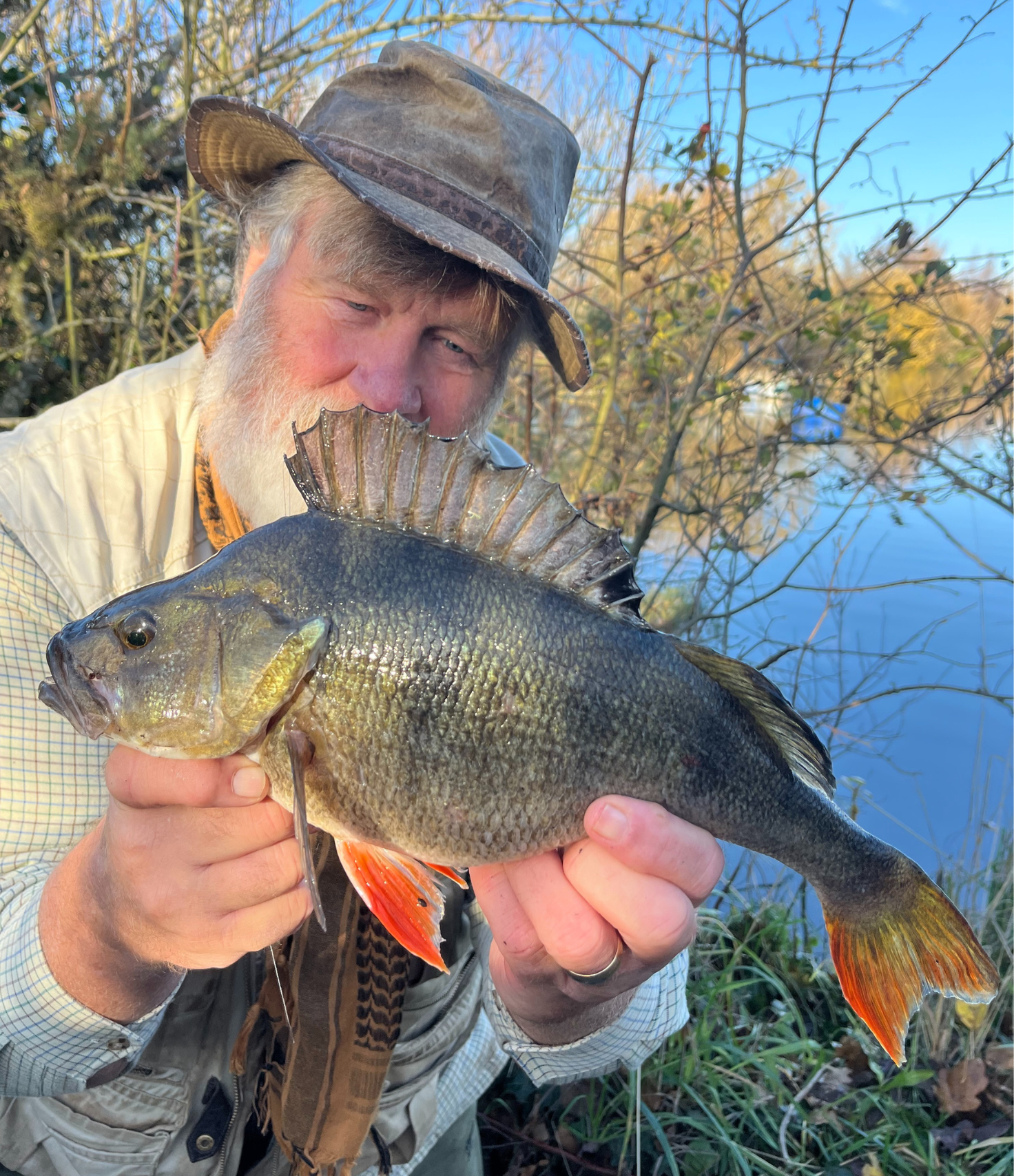 Des with a big perch caught on a livebait