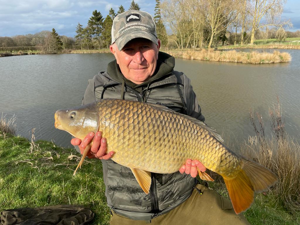 Jon Hettle, founder of Angling Protect, fishing at a UK lake